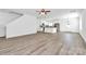 Bright open-concept living and kitchen area with new flooring and fresh paint at 4122 Old Monroe Marshville Rd, Wingate, NC 28174