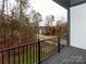 This balcony features an open-air view of the neighborhood at 428 Nathaniel Way # Brx0044, Charlotte, NC 28213