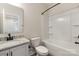 Inviting bathroom featuring a single sink vanity with countertop, toilet, and a shower/bathtub combo at 428 Nathaniel Way # Brx0044, Charlotte, NC 28213