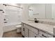 Well-lit bathroom featuring black hardware, a single sink vanity, toilet, and shower-bathtub combo at 428 Nathaniel Way # Brx0044, Charlotte, NC 28213
