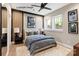 Cozy bedroom featuring a contemporary aesthetic, plush rug, and a view of the garden at 428 Nathaniel Way # Brx0044, Charlotte, NC 28213