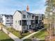 Charming townhome with a modern design, landscaped front yard, and inviting entryway at 428 Nathaniel Way # Brx0044, Charlotte, NC 28213