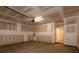 An empty garage with a garage door and concrete flooring at 428 Nathaniel Way # Brx0044, Charlotte, NC 28213