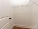 Large walk-in closet features hardwood floors and wire shelving, providing ample storage and organization at 428 Nathaniel Way # Brx0044, Charlotte, NC 28213