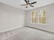 Spacious bedroom with neutral carpet, two windows, and ample natural light at 432 Nathaniel Way # Brx0043, Charlotte, NC 28213