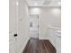 Hallway featuring wood-style floors with natural light leading to a bedroom at 432 Nathaniel Way # Brx0043, Charlotte, NC 28213