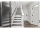 Clean staircase with painted risers and modern wood-look flooring at 432 Nathaniel Way # Brx0043, Charlotte, NC 28213