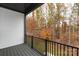 Private balcony overlooking a vibrant wooded area at 436 Nathaniel Way # Brx0042, Charlotte, NC 28213