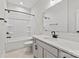 Modern bathroom featuring new fixtures, a tub-shower combo, and a bright white color scheme at 436 Nathaniel Way # Brx0042, Charlotte, NC 28213