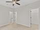 Neutral bedroom with a ceiling fan, wood-look floors, and closet access at 436 Nathaniel Way # Brx0042, Charlotte, NC 28213