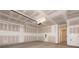 Spacious unfinished garage with insulated walls and an automatic door opener at 436 Nathaniel Way # Brx0042, Charlotte, NC 28213
