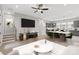 Open concept living space featuring a TV, adjacent dining area, and kitchen at 436 Nathaniel Way # Brx0042, Charlotte, NC 28213