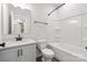 Bright bathroom with a shower-tub combo, vanity, and toilet, featuring clean and modern fixtures at 440 Nathaniel Way # Brx0041, Charlotte, NC 28213
