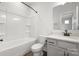 Traditional bathroom features a tub-shower combo, neutral finishes, and single vanity at 440 Nathaniel Way # Brx0041, Charlotte, NC 28213