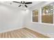 Bright bedroom with natural light, wood floors, ceiling fan, and neutral paint for a serene feel at 440 Nathaniel Way # Brx0041, Charlotte, NC 28213
