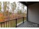 A deck with views of a treed backyard at 440 Nathaniel Way # Brx0041, Charlotte, NC 28213