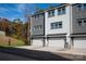 Modern townhomes with attached garages offer a sleek design and convenient living in a vibrant community at 440 Nathaniel Way # Brx0041, Charlotte, NC 28213