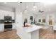 Modern kitchen with a large island, stainless steel appliances, and open layout at 440 Nathaniel Way # Brx0041, Charlotte, NC 28213