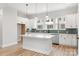 Spacious kitchen with a large island, stainless steel appliances, and bright lighting at 440 Nathaniel Way # Brx0041, Charlotte, NC 28213