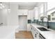 Modern kitchen featuring a large island, light countertops, and ample cabinet space at 440 Nathaniel Way # Brx0041, Charlotte, NC 28213