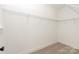 Spacious walk-in closet with ample shelving providing ample storage space at 440 Nathaniel Way # Brx0041, Charlotte, NC 28213