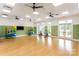 This fitness center features exercise machines, hardwood floors, and lots of natural light at 4436 Moxie Way, Charlotte, NC 28215