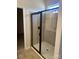 Primary bathroom with walk-in shower and frameless glass door at 608 Lispenard Ct, Mount Holly, NC 28120