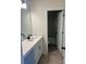 Clean bathroom, featuring vanity with white cabinets and bathtub at 608 Lispenard Ct, Mount Holly, NC 28120
