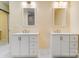 Modern bathroom featuring double vanities with sleek countertops, contemporary fixtures, and ample storage space at 751 White Jenkins Rd, Bessemer City, NC 28016