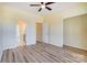This bedroom features hardwood floors, neutral paint and multiple doorways providing easy access to other spaces at 751 White Jenkins Rd, Bessemer City, NC 28016