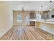 Open concept kitchen featuring stainless appliances, a large island, and modern gray cabinetry at 751 White Jenkins Rd, Bessemer City, NC 28016