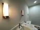 Contemporary bathroom with sleek vanity, modern faucet, and designer lighting fixtures at 139 Poplar Grove Rd, Mooresville, NC 28117