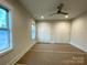 Bedroom boasts natural light with double closet doors at 139 Poplar Grove Rd, Mooresville, NC 28117