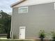 Side view showing the siding, trim, and landscaping of this new construction home at 139 Poplar Grove Rd, Mooresville, NC 28117