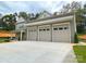 Exterior shot of the home's three-car garage and partial facade at 139 Poplar Grove Rd, Mooresville, NC 28117