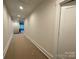 Well-lit hallway with recessed lighting leading to various rooms at 139 Poplar Grove Rd, Mooresville, NC 28117