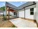 Covered patio with brick flooring and access to the backyard at 2610 Henry Baucom Rd, Monroe, NC 28110