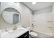 Modern bathroom with a soaking tub, marble vanity, and updated fixtures at 2610 Henry Baucom Rd, Monroe, NC 28110