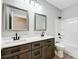 Bathroom with double vanity, white countertop, and shower/tub combo at 2610 Henry Baucom Rd, Monroe, NC 28110