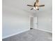 Spacious bedroom with ceiling fan and access to hallway at 2610 Henry Baucom Rd, Monroe, NC 28110