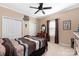 Bedroom with wooden bed frame and window coverings at 7457 Waterleaf Ct, Stanley, NC 28164