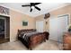 Bedroom with wooden bed frame and neutral decor at 7457 Waterleaf Ct, Stanley, NC 28164