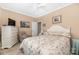 Bedroom with dresser, chair, and window coverings at 7457 Waterleaf Ct, Stanley, NC 28164