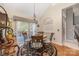 Bright breakfast nook with table and chairs near sliding door at 7457 Waterleaf Ct, Stanley, NC 28164