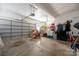 Garage interior with storage shelving and large door at 7457 Waterleaf Ct, Stanley, NC 28164