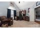 Home office with a large desk and built-in cabinetry at 7457 Waterleaf Ct, Stanley, NC 28164