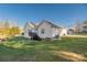 House exterior showcasing a deck and well-maintained lawn at 7457 Waterleaf Ct, Stanley, NC 28164