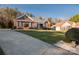 Brick home with driveway and landscaping at 7457 Waterleaf Ct, Stanley, NC 28164