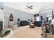 Bright living room featuring comfortable seating and a fireplace at 7457 Waterleaf Ct, Stanley, NC 28164