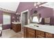 Main bathroom boasts double vanity and a relaxing soaking tub at 7457 Waterleaf Ct, Stanley, NC 28164